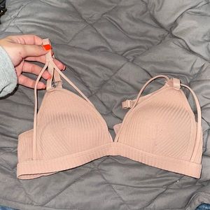 Small pink bralette with straps and push up padding